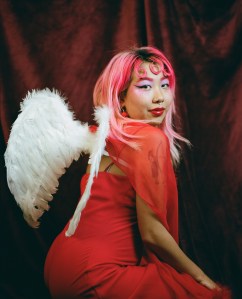 Michelle Zhu with pink hair in a portrait by Carter Schneider.