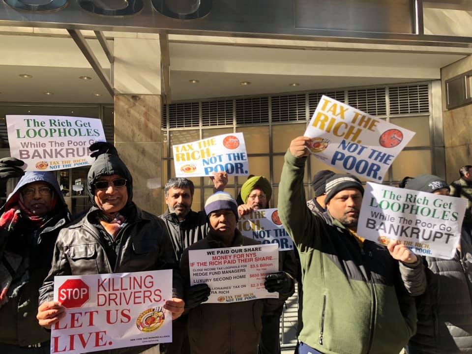 People protesting the congestion pricing fee targeting taxi drivers.