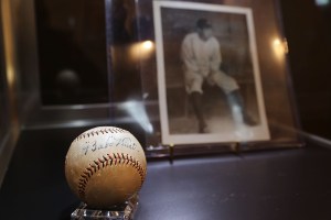 a baseball signed by Babe Ruth is displayed at auction house Christie's