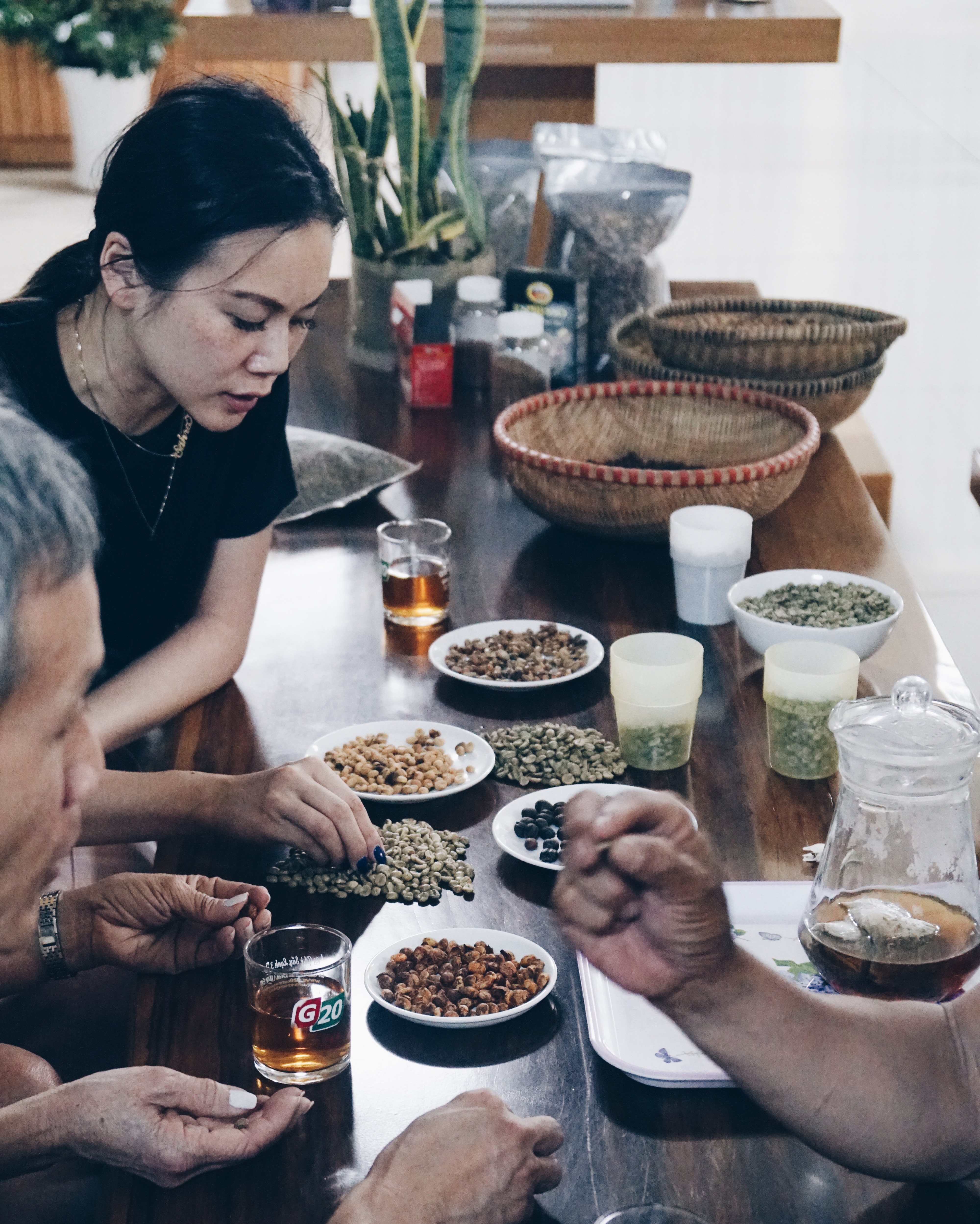 Sahra Nguyen Sampling Coffee Beans in Vietnam