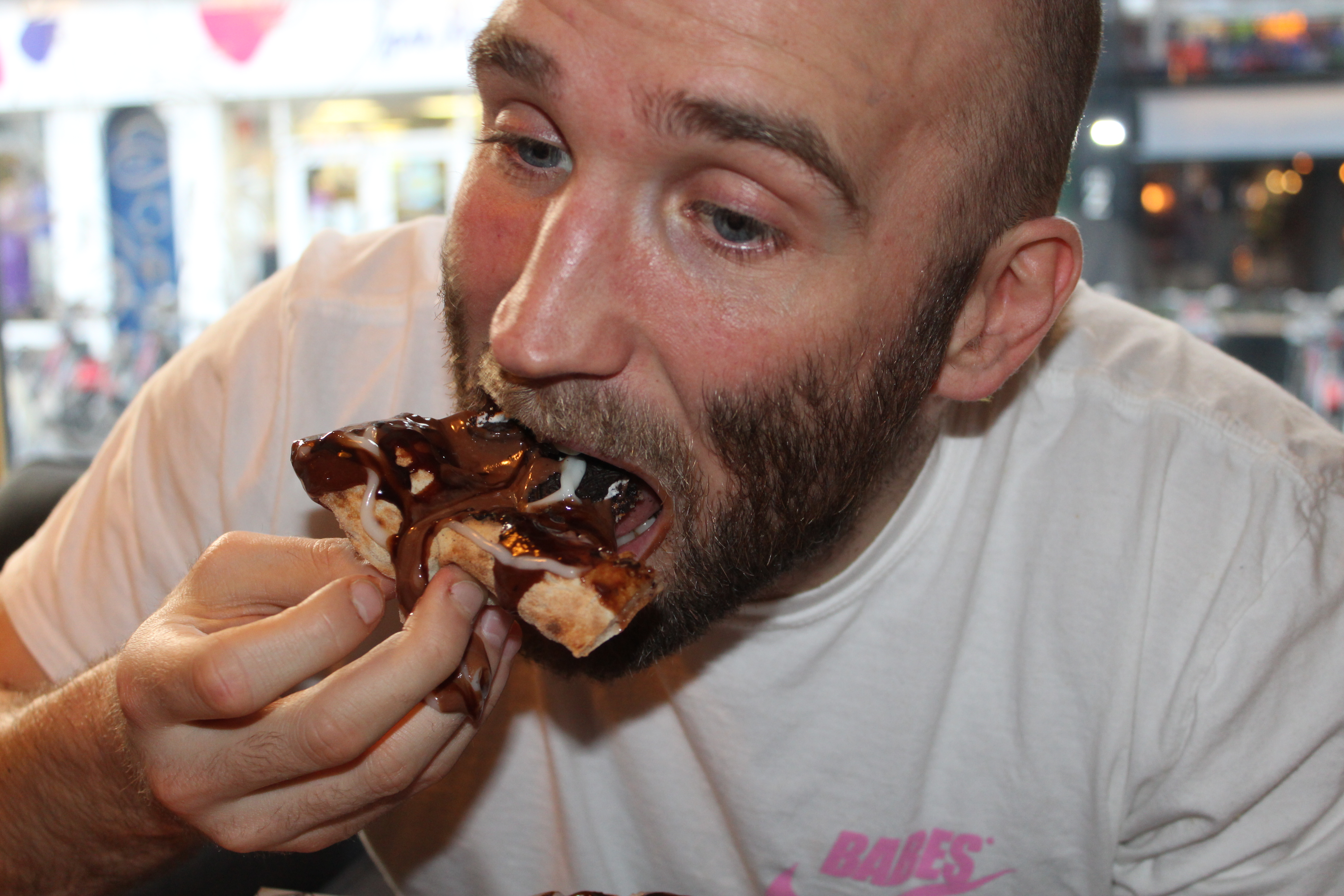 Thomas 'Tom' Usher eats an Oreo pizza