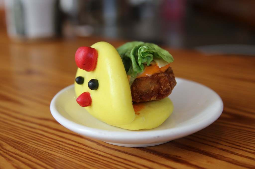 A chickshaped bao filled with fried chicken