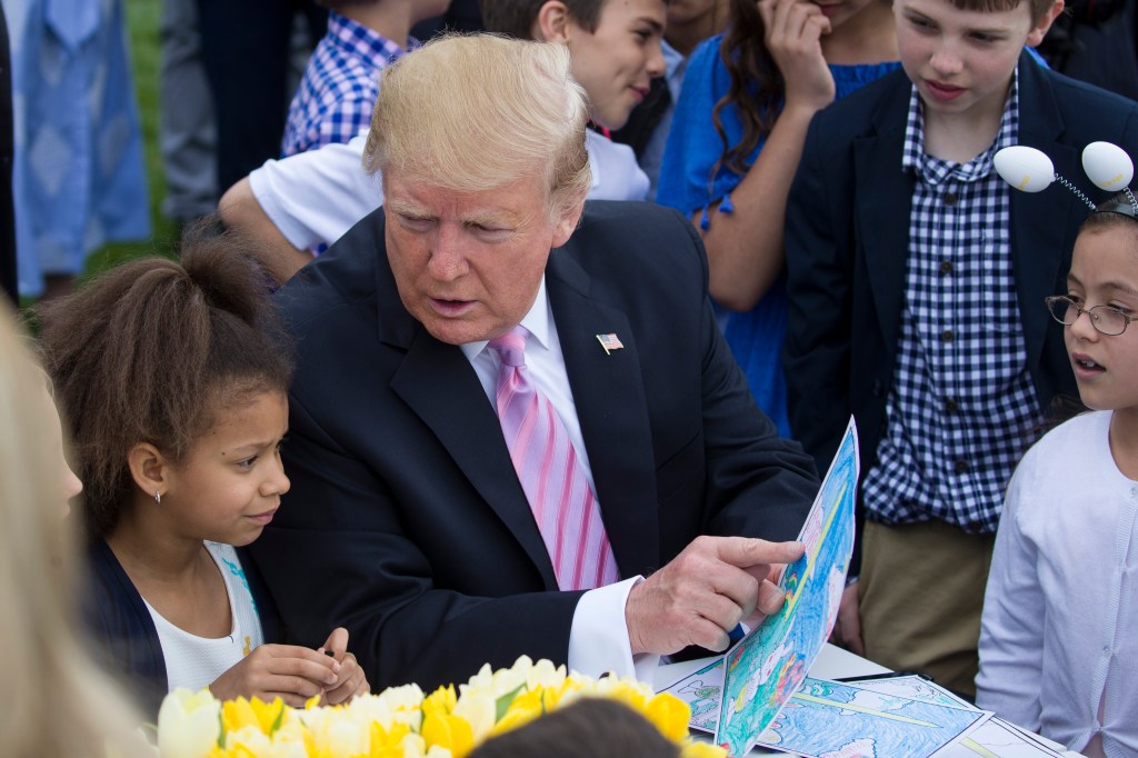 Trump assures kids at the White House Easter Egg Roll that the wall is happening