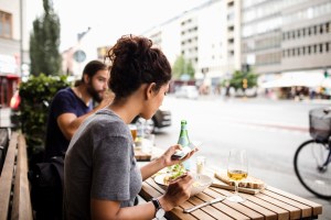 girl at cafe on phone