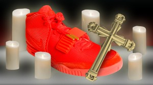 A Yeezy 2 sneaker sits among candles and a cross