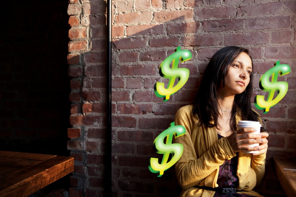 A sad woman holding a coffee surrounded by dollar signs.