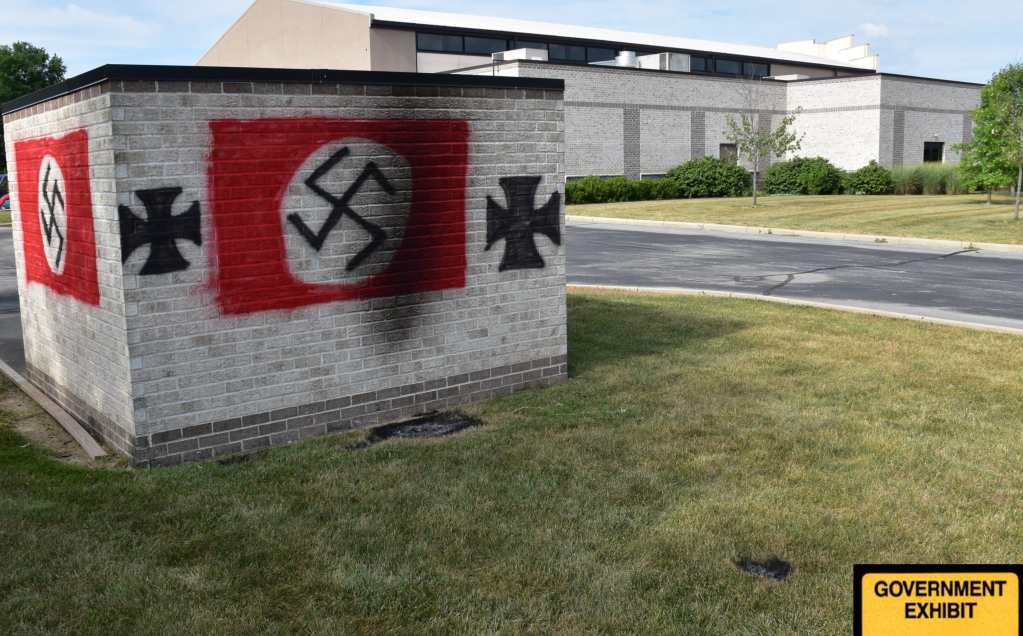 Nolan Brewer and his wife Kiyomi drove 50 miles across Indiana to paint huge swastikas on a synagogue and scorch its grounds.