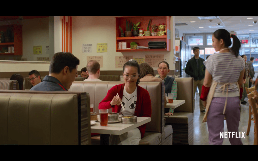 a screenshot of ali wong and randall park eating dim sum in netflix's "always be my maybe"