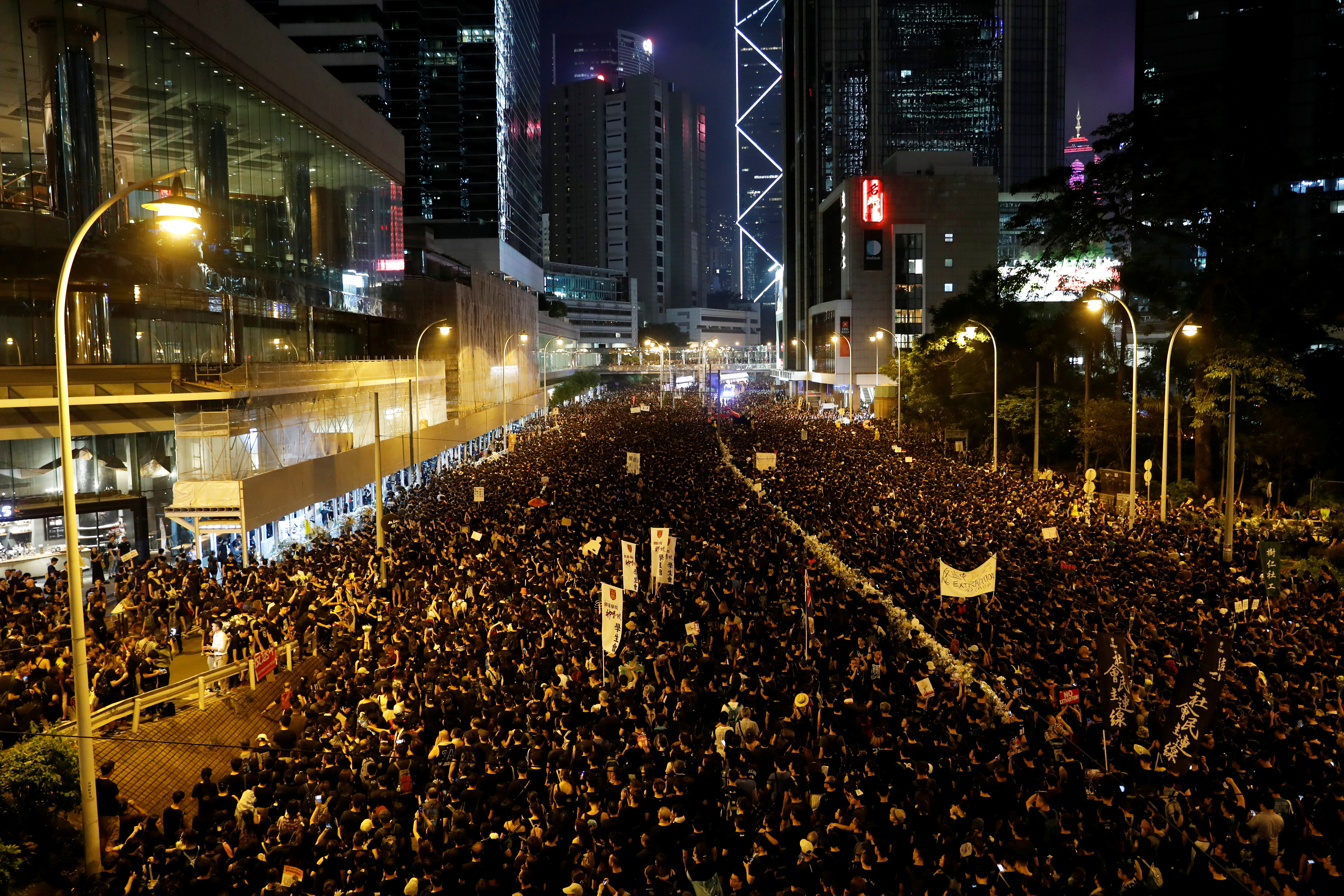 Protesters flood the streets of Hong Kong demanding that the region's leaders step down.