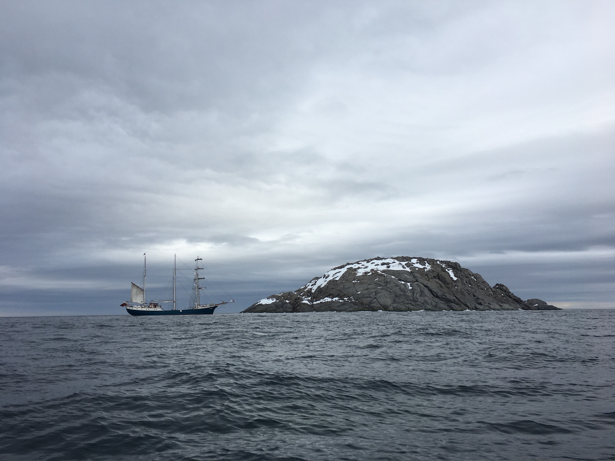 Our boat anchored off Rossøya. Sir John Franklin encountered impenetrable sea ice at this point 200 years ago. Photo by Craig S. Smith