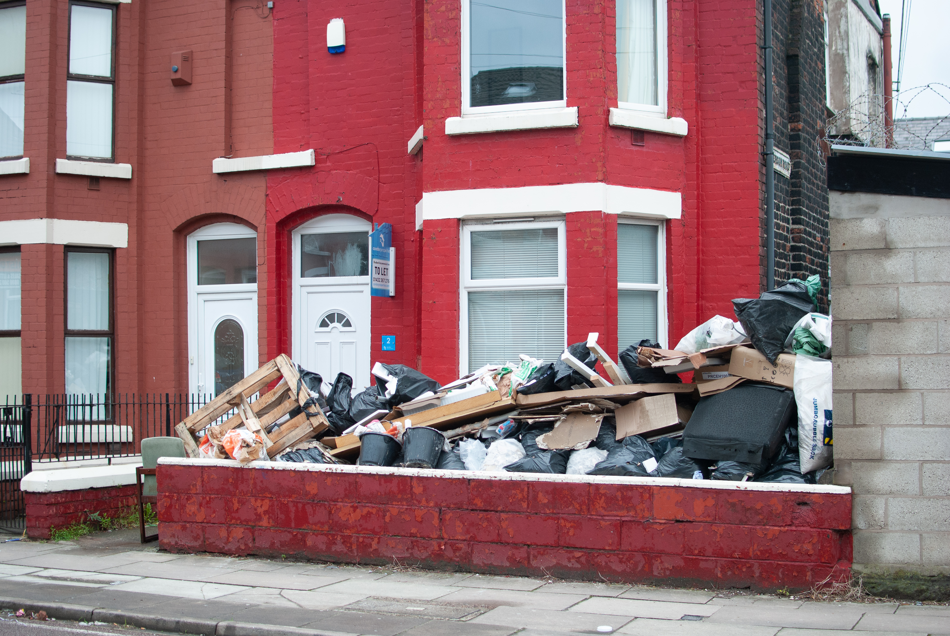 rubbish outside house