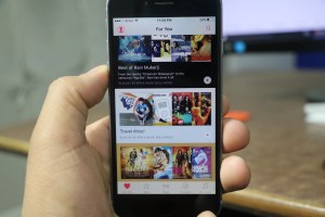 An iPhone displays Apple Music. It's very hard to find out how to access your favorite songs on the service.