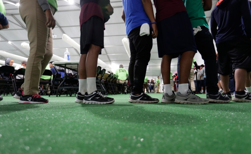 HHS invited journalists and politicians to visit a new emergency shelter in Carrizo Springs, Texas, which had soccer fields, a gazebo, and well-equipped classrooms.