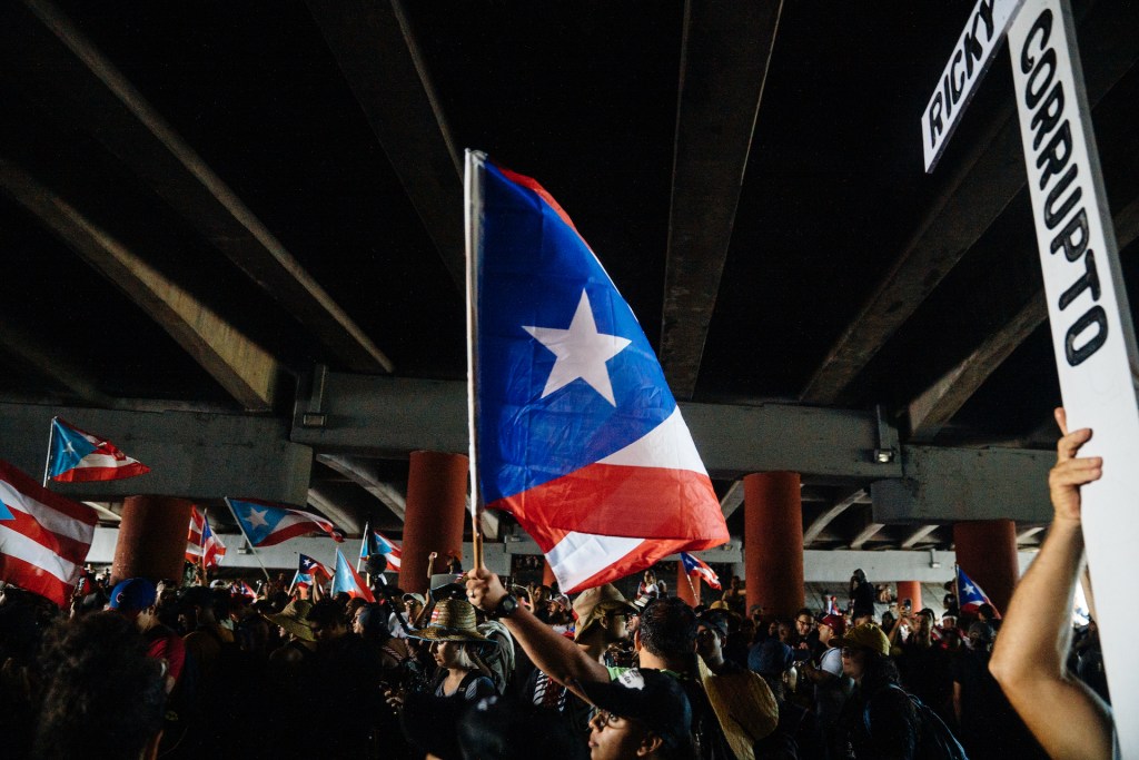 Protesters clashed with police, who used tear gas to disperse a crowd that threw bottles and rocks.