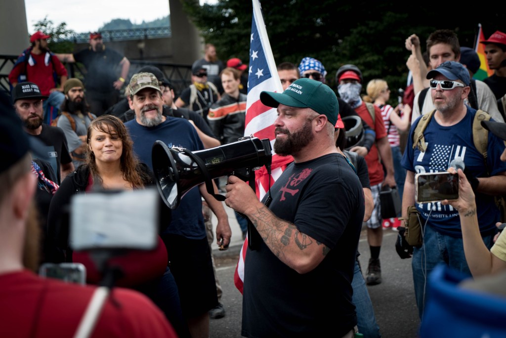 PORTLAND, Oregon — Hundreds of far-right protesters gathered in downtown Portland on Saturday to flex their patriotism, their loathing of antifa, and their respect for the cops.