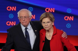 Senators Bernie Sanders and Elizabeth Warren pose together at CNN's Democratic debate