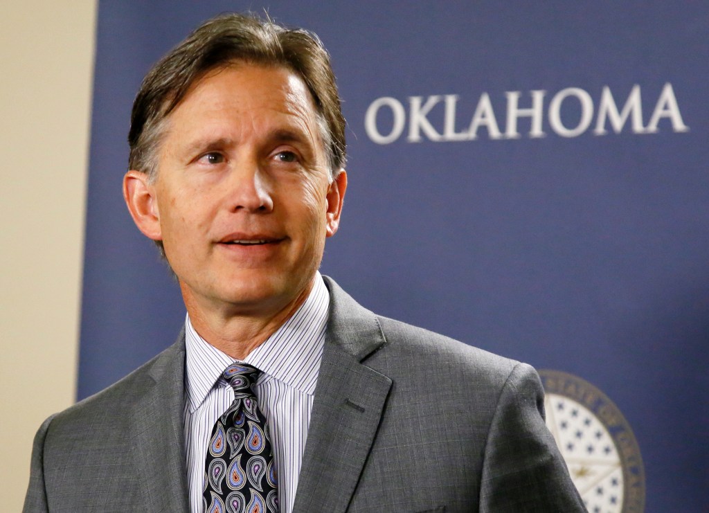 In this April 26, 2017, file photo, Oklahoma Attorney General Mike Hunter speaks at a news conference in Oklahoma City. (AP Photo/Sue Ogrocki, File)​