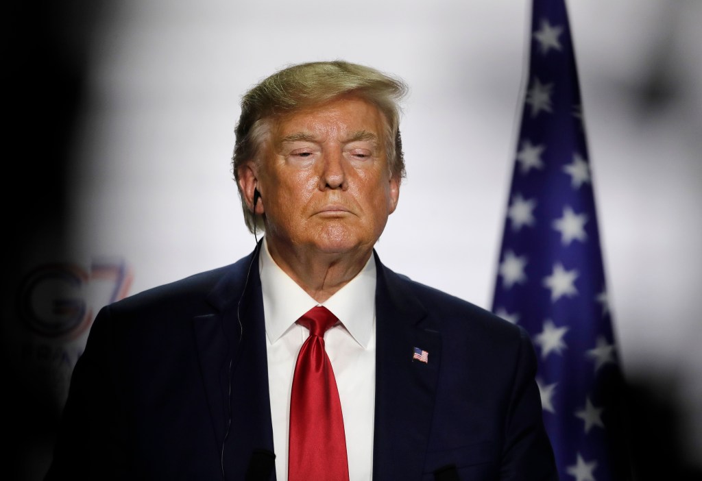 President Donald Trump listens to a question during a press conference on the third and final day of the G-7 summit in Biarritz, France Monday, Aug. 26, 2019. (AP Photo/Markus Schreiber)​