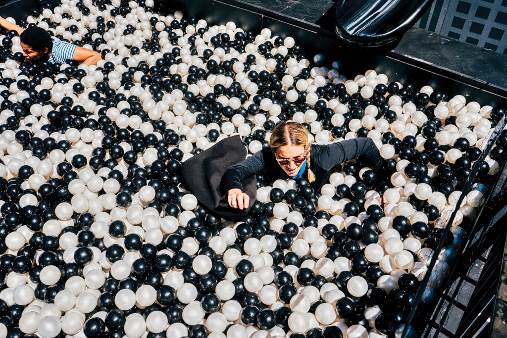 Dayna Evans party crashing Sephora-branded ball pit