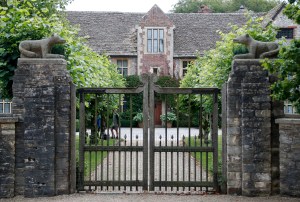 A gate protects the entrance of the Rooksnest estate near Lambourn, England, Tuesday, Aug. 6, 2019.