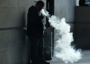 The vapor cloud produced by a man with an e-cigarette in London. Picture date: Thursday September 19, 2019. Photo credit should read: Yui Mok/PA Wire URN:45385895 (Press Association via AP Images)​