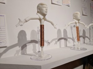 3D printed IUDs with donald trump's face and arms