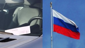 Parking ticket on car and Russian flag