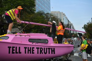 Environmental activists block an intersection as they gather to protest to shut down the city during global climate action week on September 23, 2019 in Washington, DC.