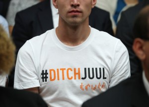 Man wears a #DitchJuul shirt