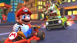 Mario Kart Tour art showing Bowser chasing Mario