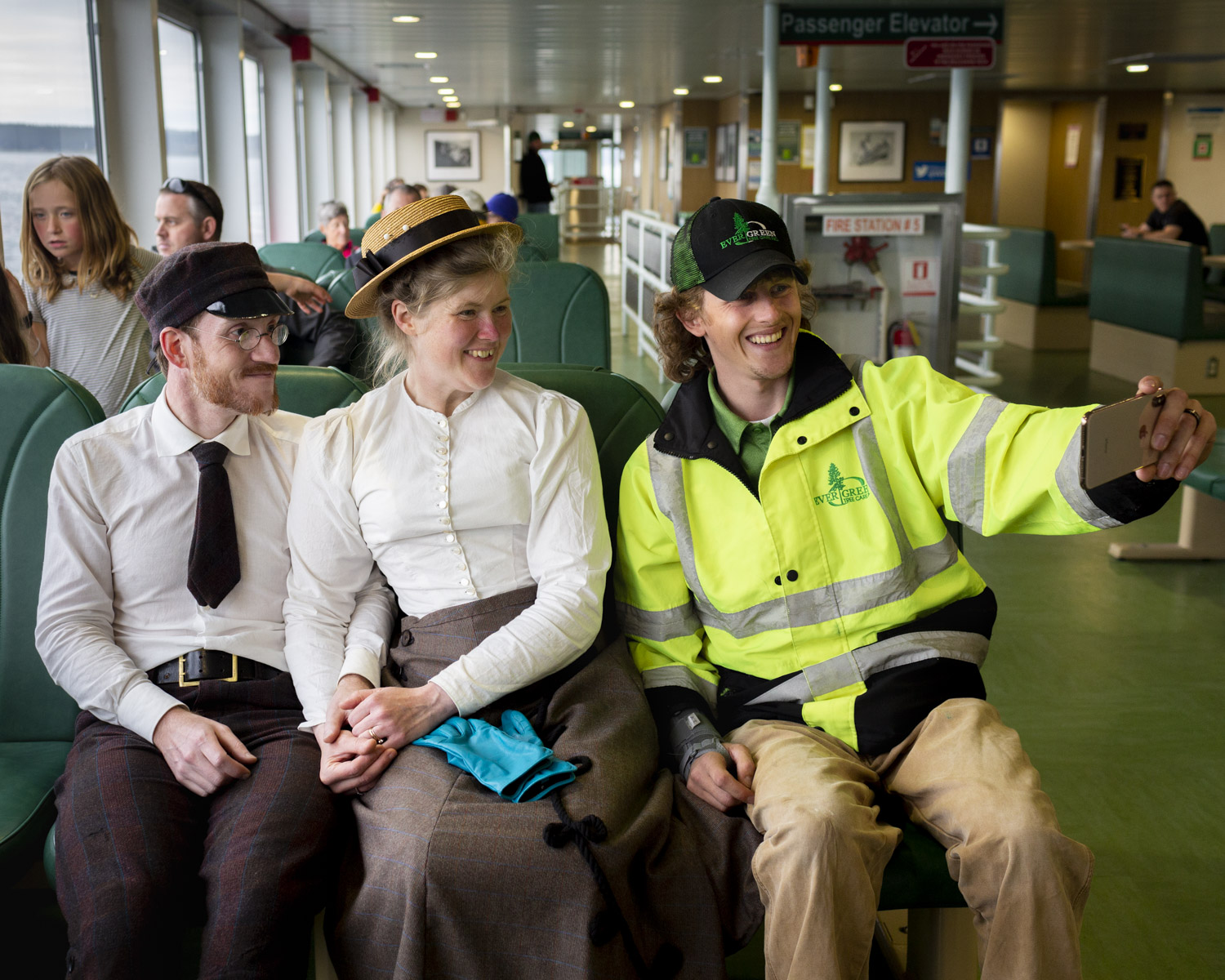 Taking a photo on the ferry with an interested bystander