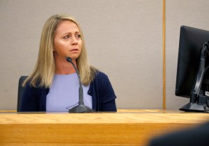 Fired Dallas police officer Amber Guyger becomes emotional as she testifies in her murder trial, Friday, Sept. 27, 2019, in Dallas.