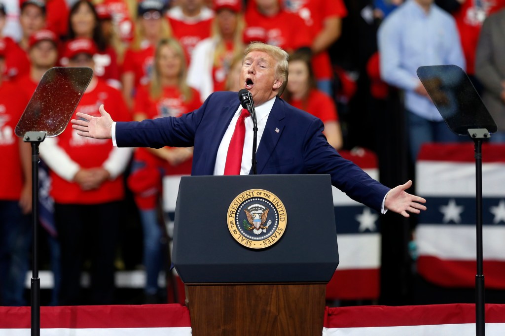 President Donald Trump speaks at a campaign rally Thursday, Oct. 10, 2019, in Minneapolis. (AP Photo/Jim Mone)