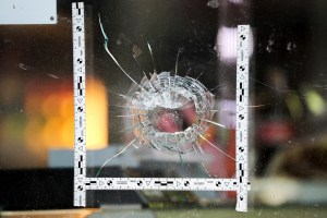 Police markings stick around a bullet in the window of a kebab shop. During attacks in the middle of Halle an der Saale in Saxony-Anhalt yesterday two people were shot dead in front of a synagogue and in a kebab snack bar.