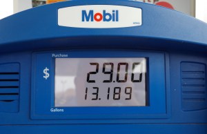 In this June 26, 2019, file photo a Mobil gas pump displays the various types of fuel and their prices at this Flowood, Miss., station. Exxon Mobil Corp. reports financial results Friday, Aug. 2. (AP Photo/Rogelio V. Solis, File)