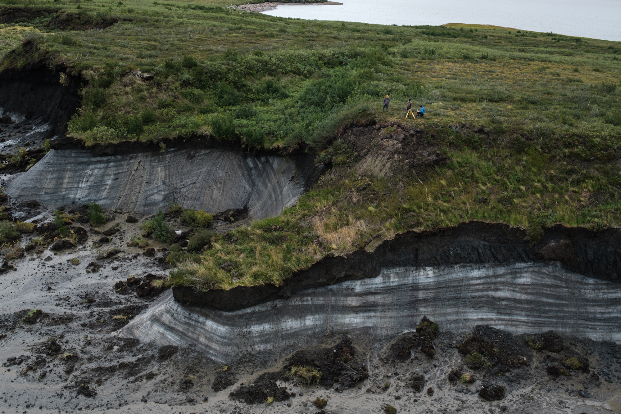 An aerial view of shore erosion and exposed ground ice at Peninsula Point, about five kilometres west of Tuktoyaktuk. The ground in the area is 90 percent ice.