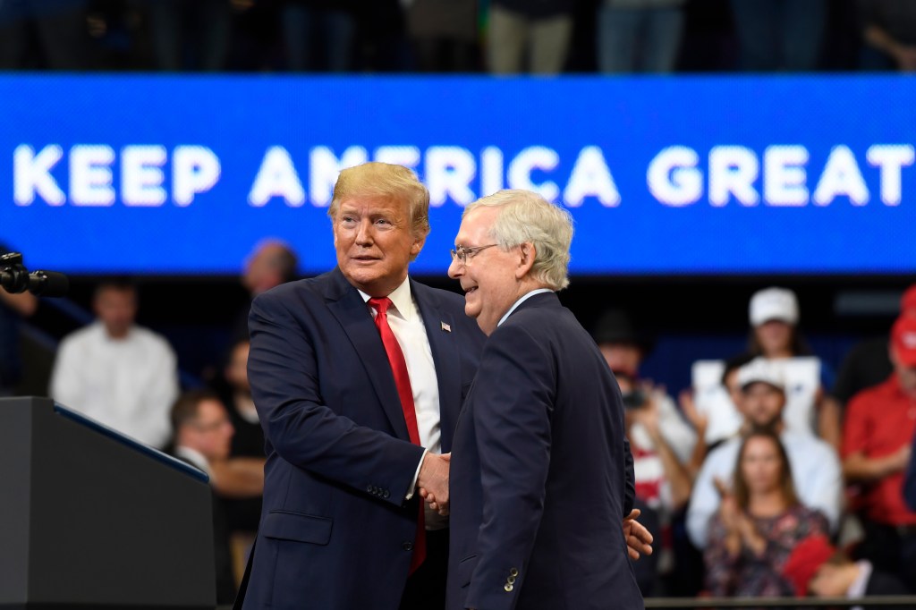 People in the crowd react as President Donald Trump speaks at a campaign rally in, Lexington, Ky., Monday, Nov. 4, 2019.