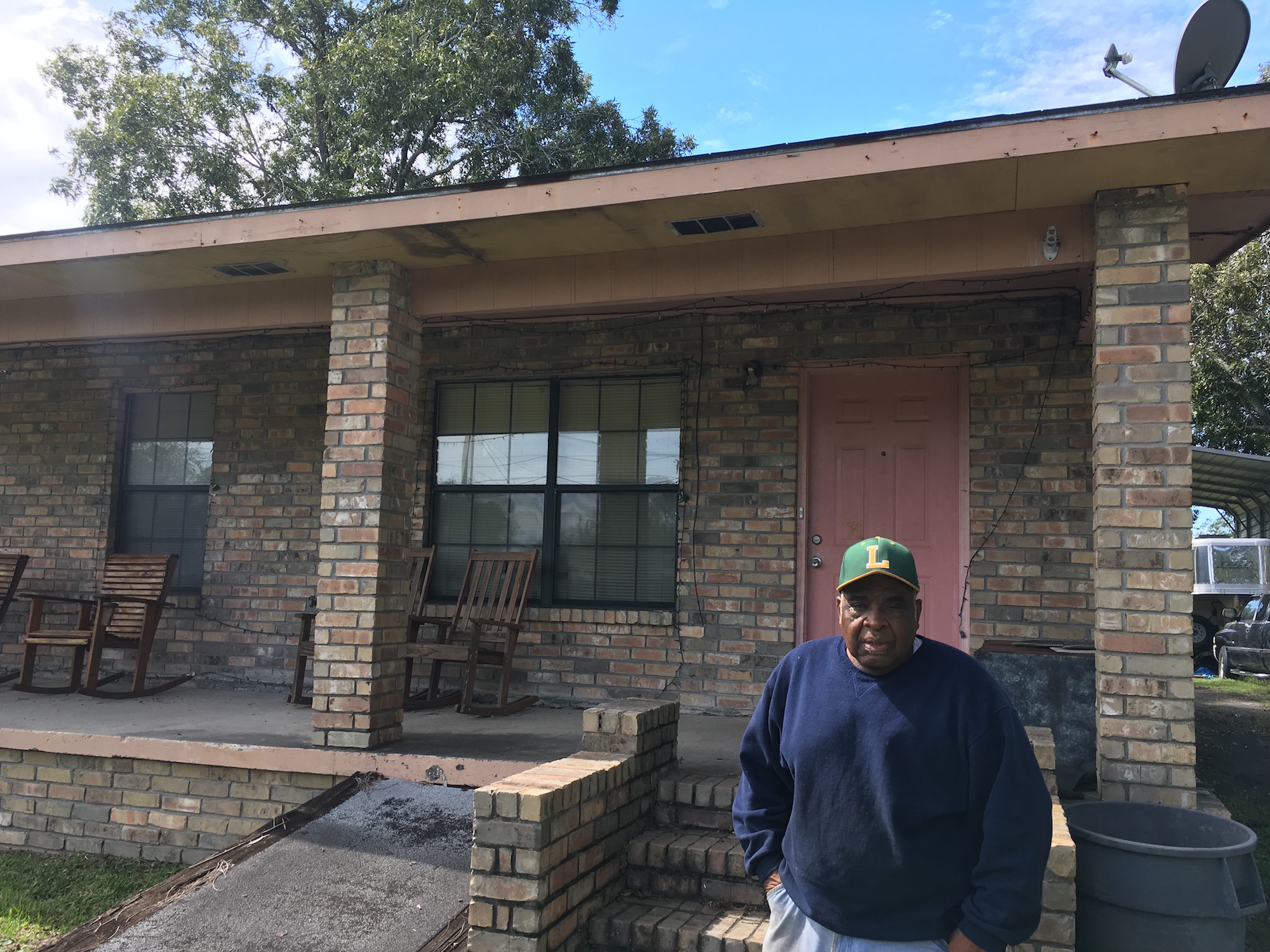 Harold Terrance outside his home in Pecan Acres. Photo by the author