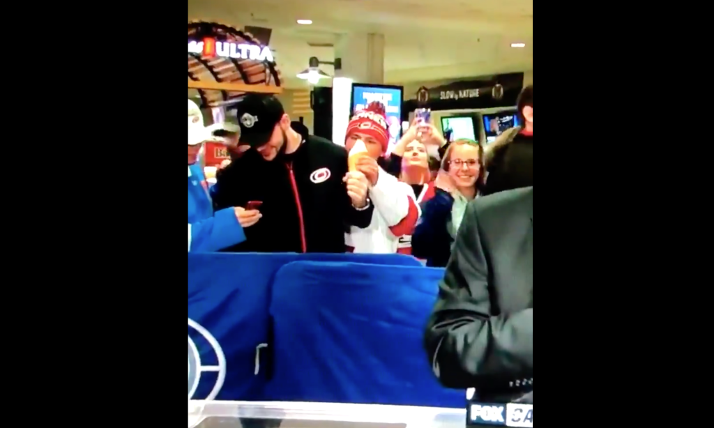 hockey fan stealing ice cream cone