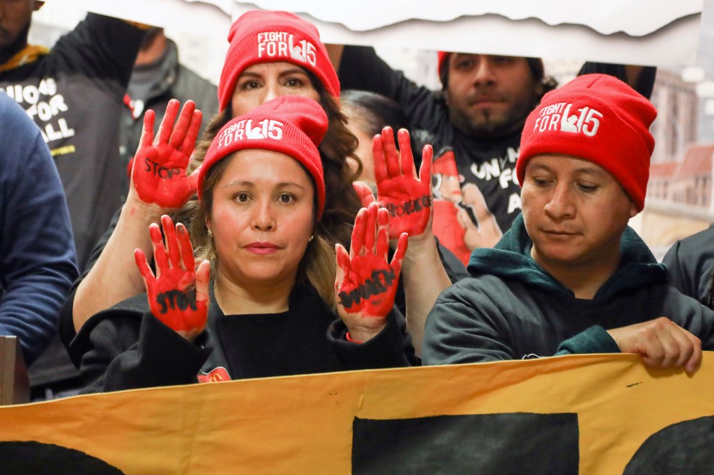 McDonald's employees gather during a protest at City Hall in Chicago on Thursday, Nov. 21, 2019.