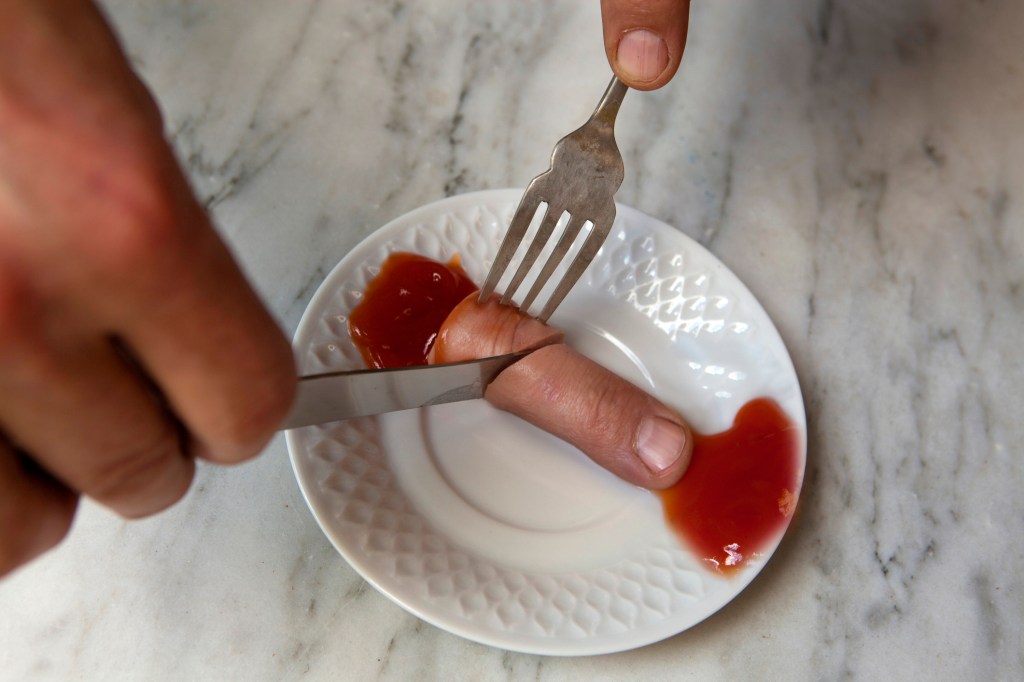 fake human finger being eaten