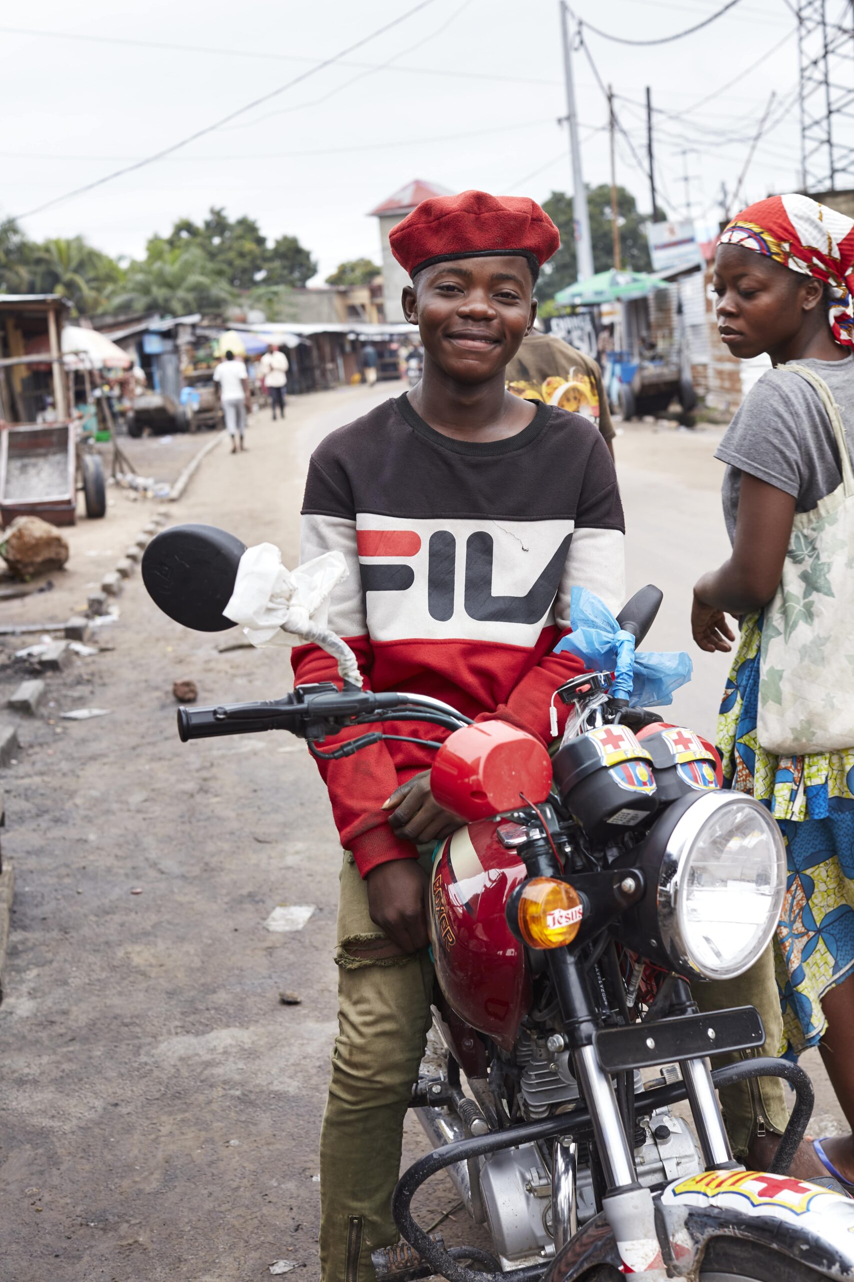 kinshasha congo motorcycle taxi rider street style