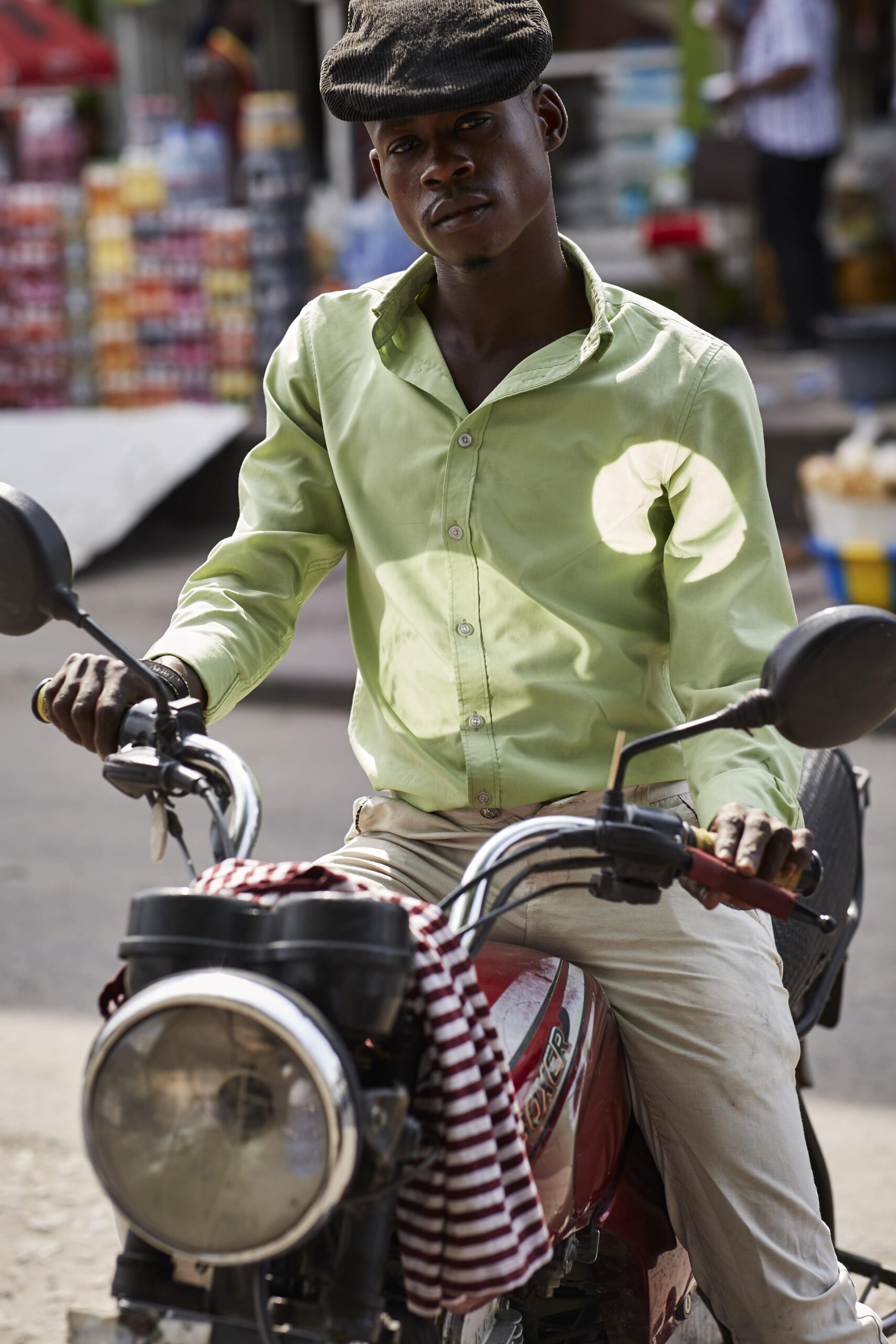 kinshasha congo motorcycle taxi rider street style