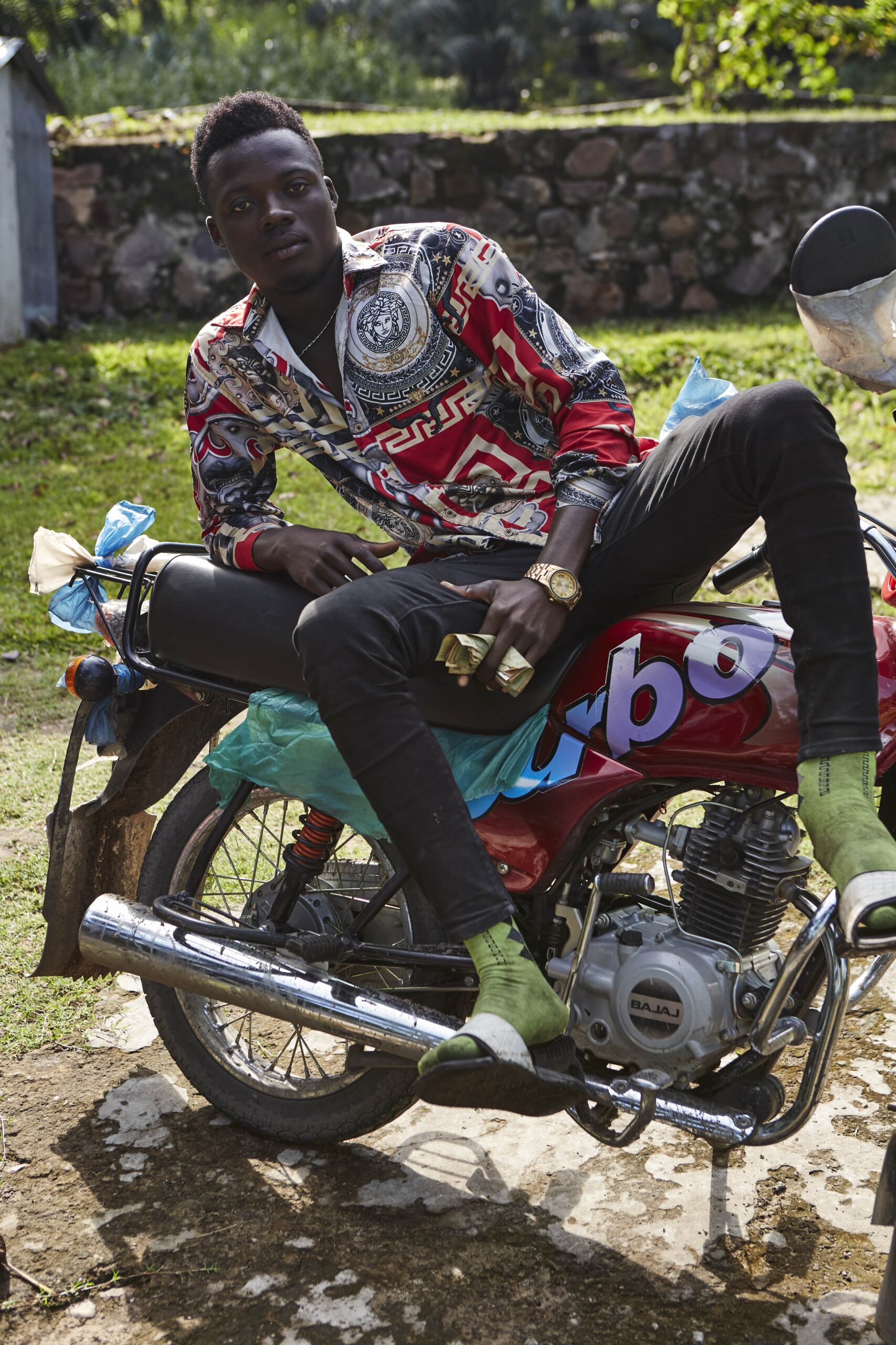 kinshasha congo motorcycle taxi rider street style