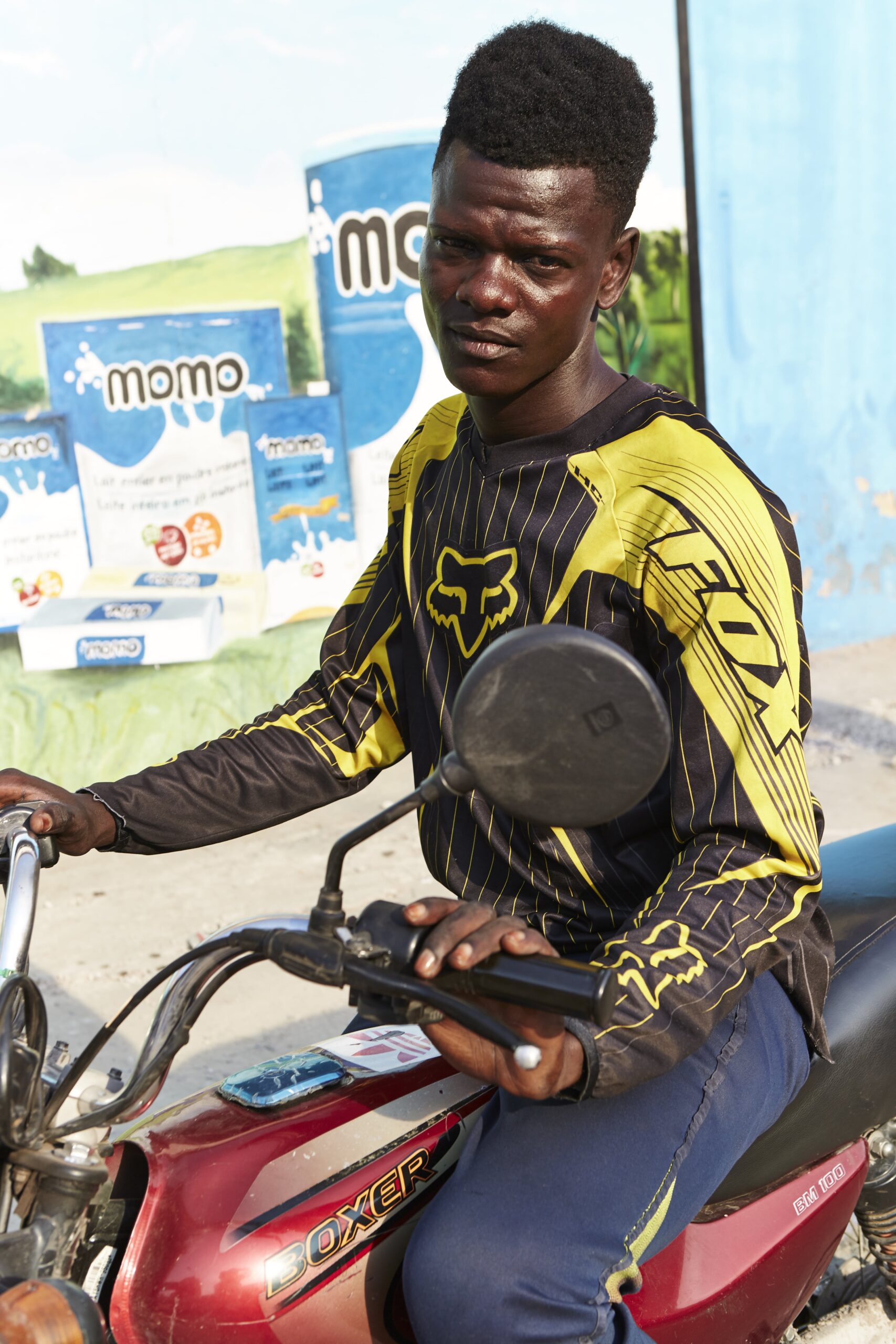 kinshasha congo motorcycle taxi rider street style