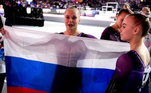 Russia's Angelina Melnikova poses for a photo after winning silver for the women's team final at the Artistic Gymnastics World Championships, in Stuttgart, Germany.