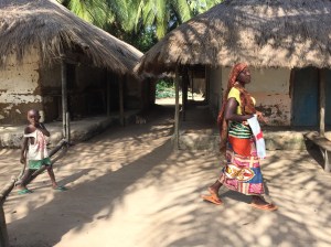 huts and people in guinea-bissau