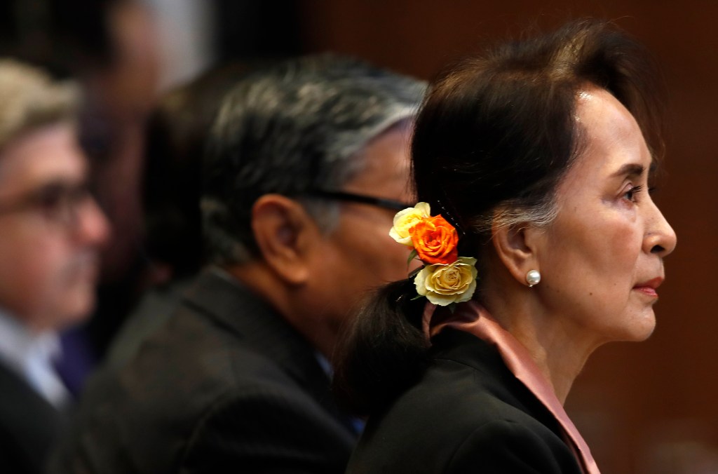 Myanmar's leader Aung San Suu Kyi sits in the court room of the International Court of Justice in The Hague, Netherlands, Tuesday, Dec. 10, 2019.