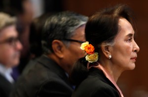 Myanmar's leader Aung San Suu Kyi sits in the court room of the International Court of Justice in The Hague, Netherlands, Tuesday, Dec. 10, 2019.