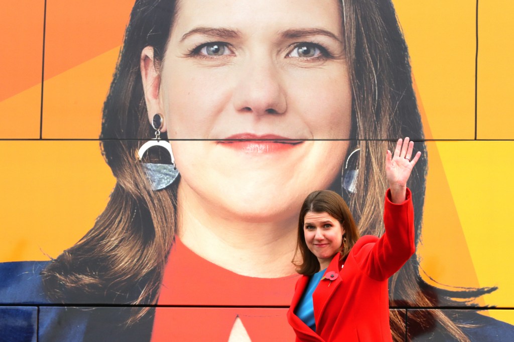 Jo Swinson in front of the battle bus